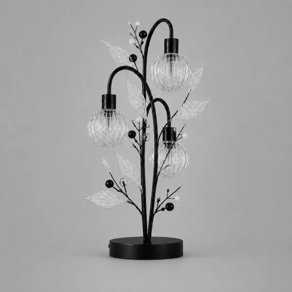 Crystal berry botanical table lamp on grey background unlit — black metal botanical tree with three ribbed glass globe cages, clear ribbed glass leaves and black and pearl bead sprays