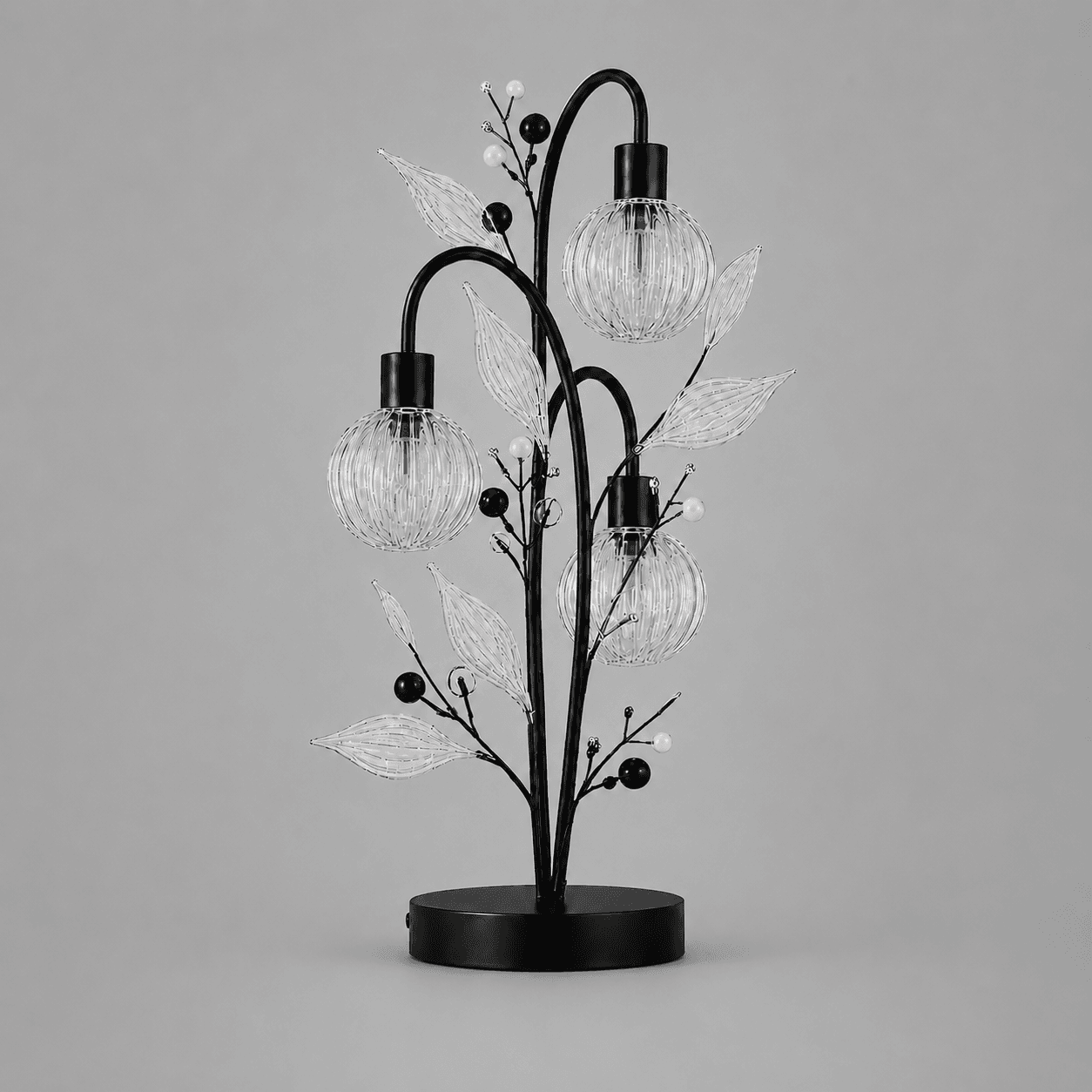 Crystal Berry Botanical Table Lamp — 3-Light Ribbed Glass Globe & Leaf Tree 3 Crystal berry botanical table lamp on grey background unlit — black metal botanical tree with three ribbed glass globe cages, clear ribbed glass leaves and black and pearl bead sprays
