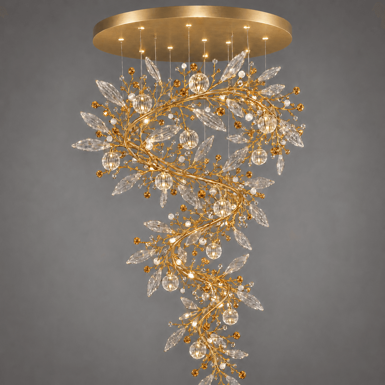 Crystal Vine Foyer Chandelier — Spiral Leaf & Globe Crystal Cascade 4 Crystal vine foyer chandelier close-up on grey background — satin gold branches with marquise crystal leaves, pearl-white beads and lit ribbed globe pendants