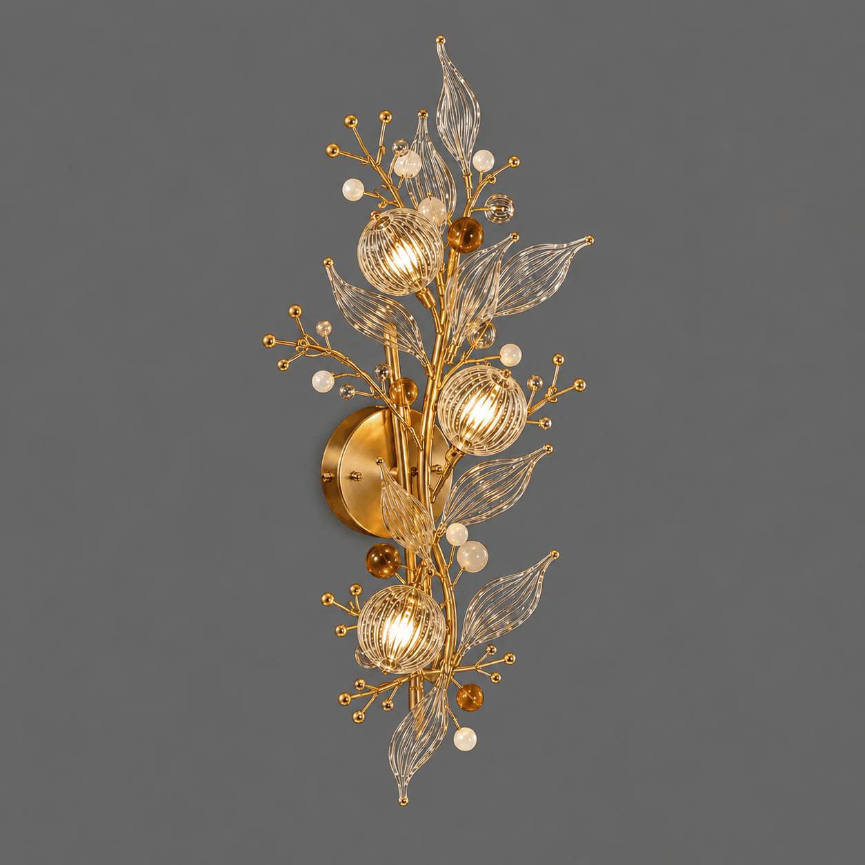 Crystal Botanical Wall Sconce — 3-Light Glass Globe & Leaf Bouquet 4 Crystal botanical wall sconce on grey background lit — 3-light gold branch bouquet with ribbed glass globes, clear glass leaves, amber orbs and warm glow