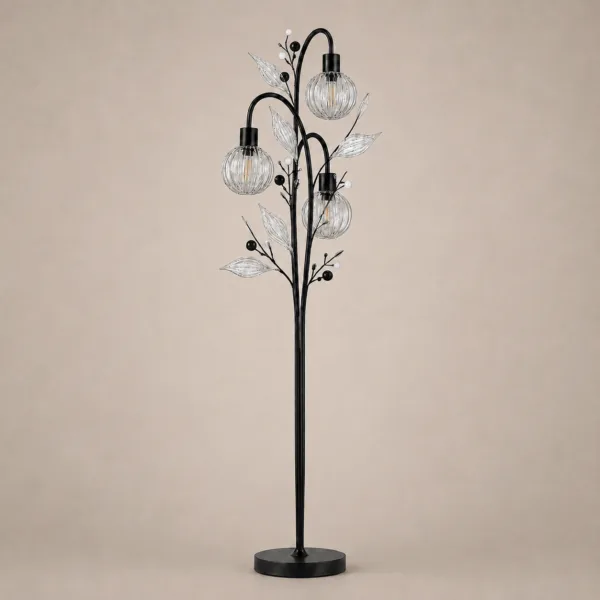 Crystal berry botanical floor lamp on warm beige background unlit — black metal tree with three ribbed glass globe cages, clear ribbed glass leaves, matte black and white pearl glass beads