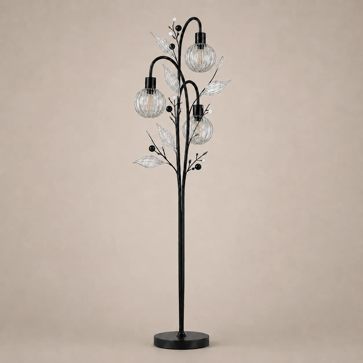 Crystal Berry Botanical Floor Lamp – 3-Light Ribbed Glass Globe Tree 5 Crystal berry botanical floor lamp on warm beige background unlit — black metal tree with three ribbed glass globe cages, clear ribbed glass leaves, matte black and white pearl glass beads
