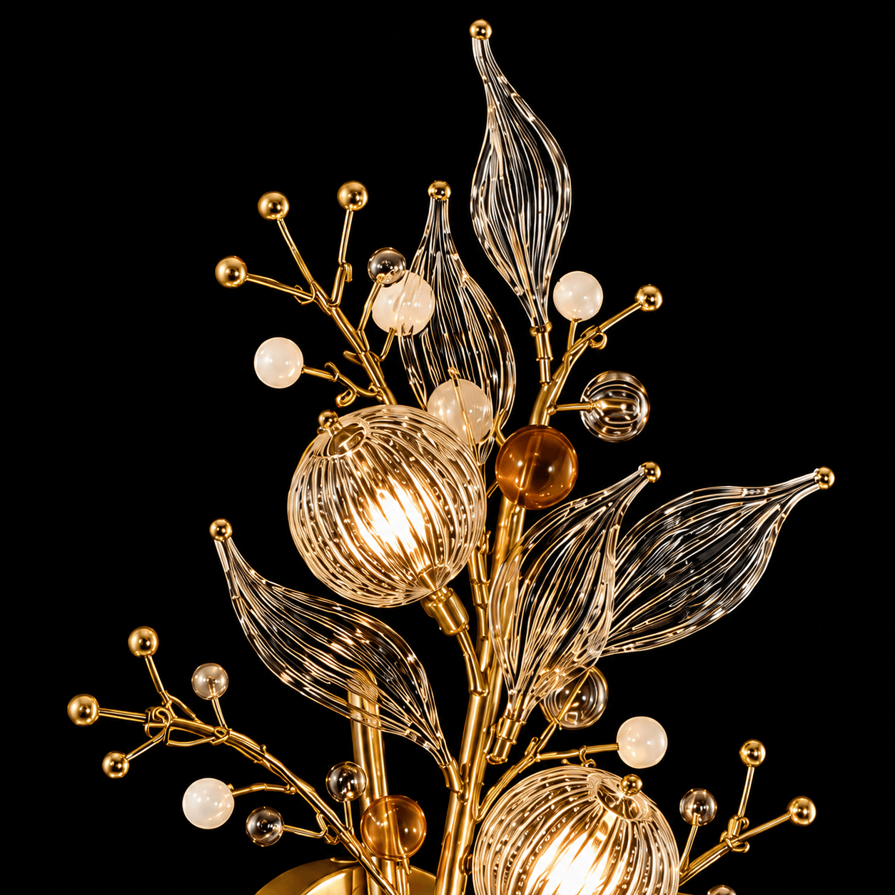Crystal Botanical Wall Sconce — 3-Light Glass Globe & Leaf Bouquet 6 Crystal botanical wall sconce close-up detail — ribbed glass globe shade lit with warm filament, amber cognac glass orb, opal pearl beads and clear ribbed glass leaf on gold branches