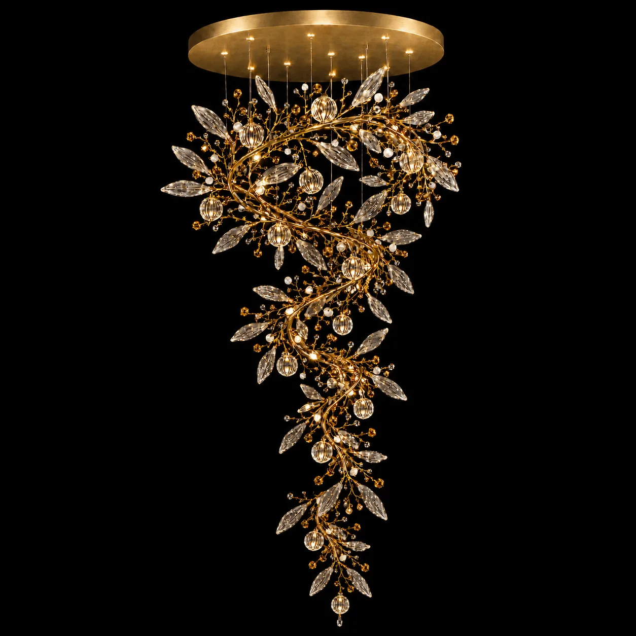 The Crystal Vine — A Sculptural Cascade of Light 2 Crystal vine foyer chandelier on black background — satin gold helix branch, marquise cut-glass leaves and ribbed globe pendants lit with warm light
