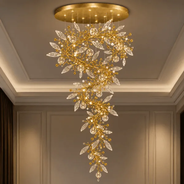 Crystal vine foyer chandelier in grand corridor — satin gold spiral branch with marquise crystal leaves and globe pendants, warm filament glow — JagMag Lights JML-414