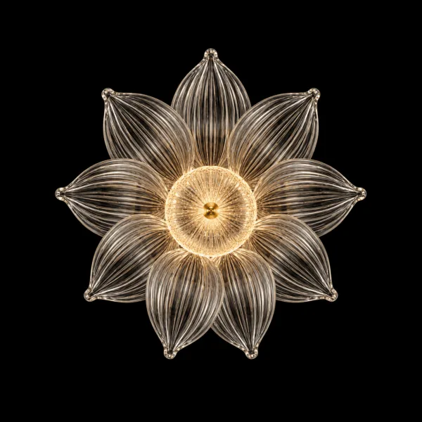 Glass flower pendant light seen from below, lit: ribbed borosilicate glass petals in a star pattern around a glowing centre