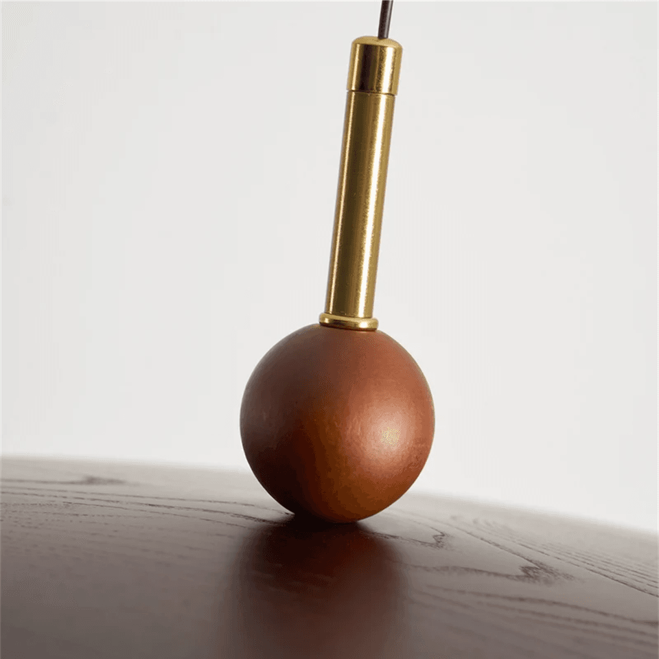 Wood and Alabaster Pendant Light – Teak Disc & Glowing Stone 35 cm | Jagmag Lights 10 Close-up of the teak wood bead and brass stem – Jagmag Lights