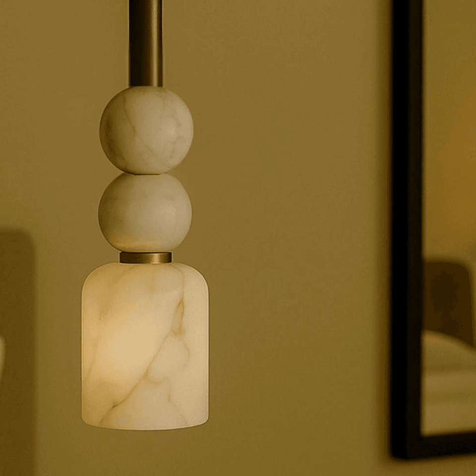 Alabaster Beaded Pendant Light – 44 cm Brass Stem | Jagmag Lights 3 Close-up of the alabaster cylinder shade showing natural veining lit from within
