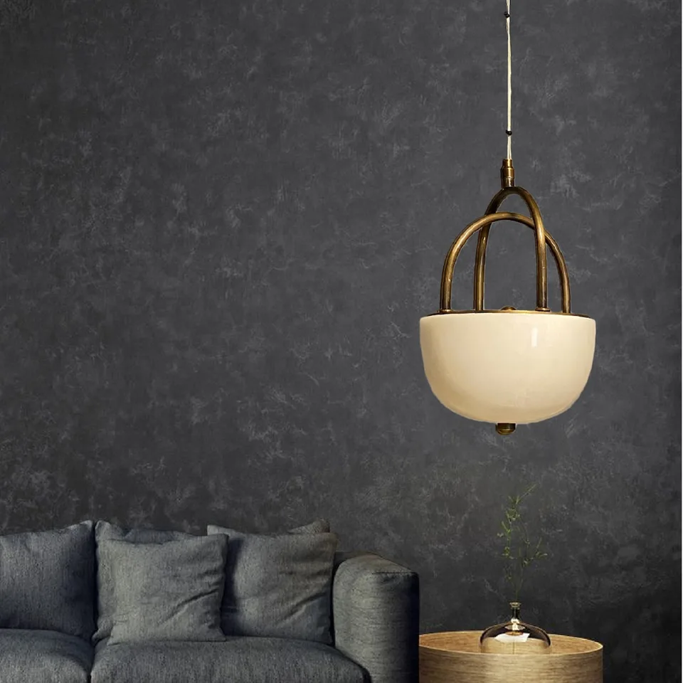 Alabaster Bowl Pendant Light – 18 cm Brass Cradle | Jagmag Lights 6 Alabaster bowl pendant light hung beside a grey sofa against a dark plaster wall