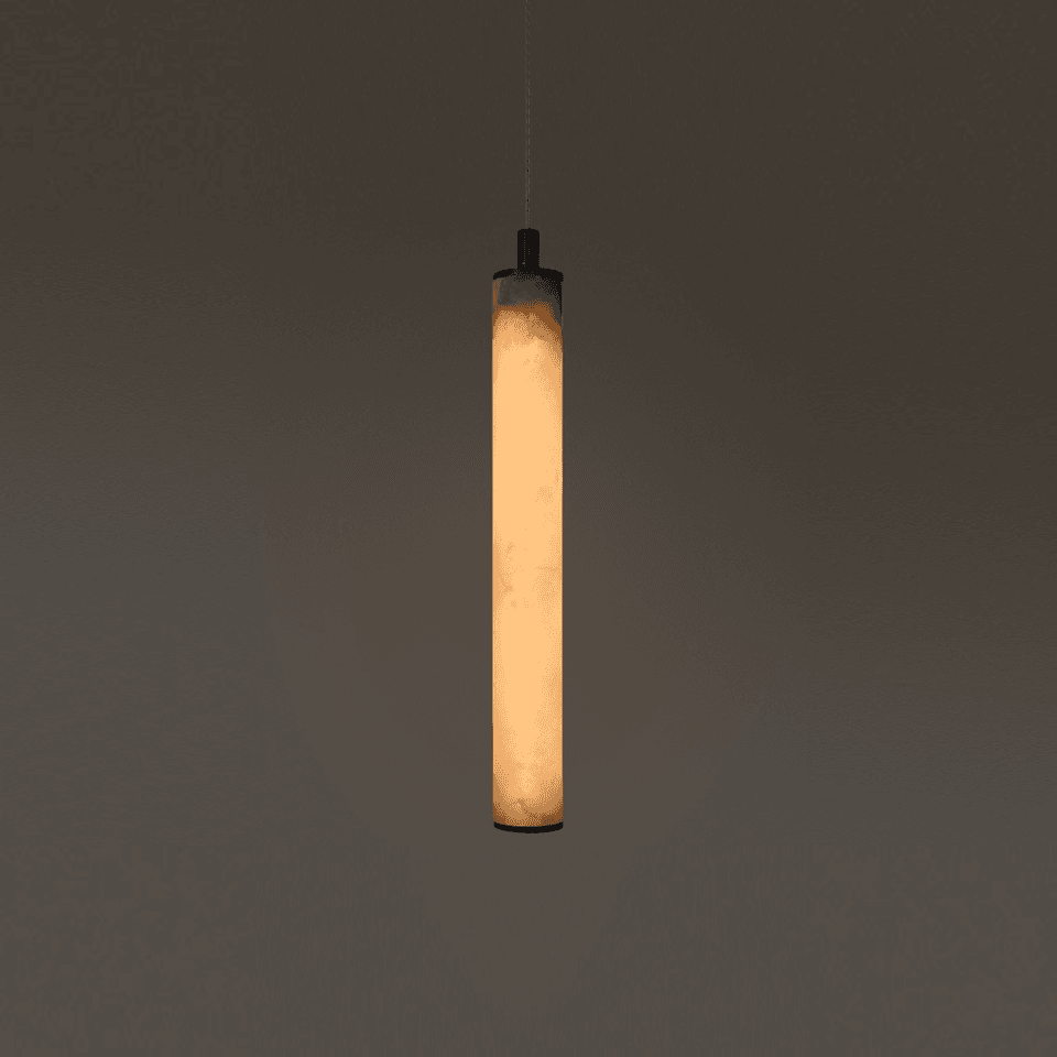 Alabaster pendant light with a 400 mm natural stone cylinder glowing warm above a dining table
