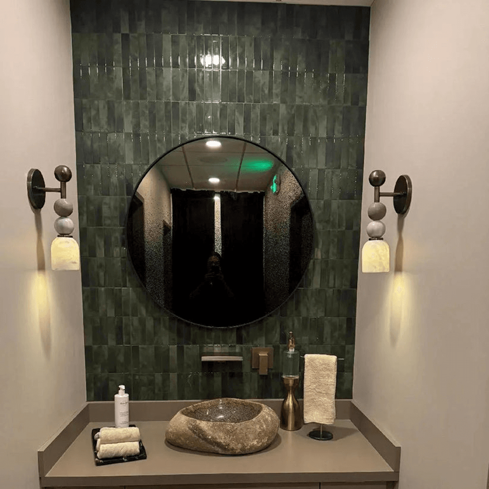 Alabaster Vanity Light – 16″ Stone Bead Sconce | Jagmag Lights 2 Pair of alabaster vanity lights flanking a round bathroom mirror on green tile