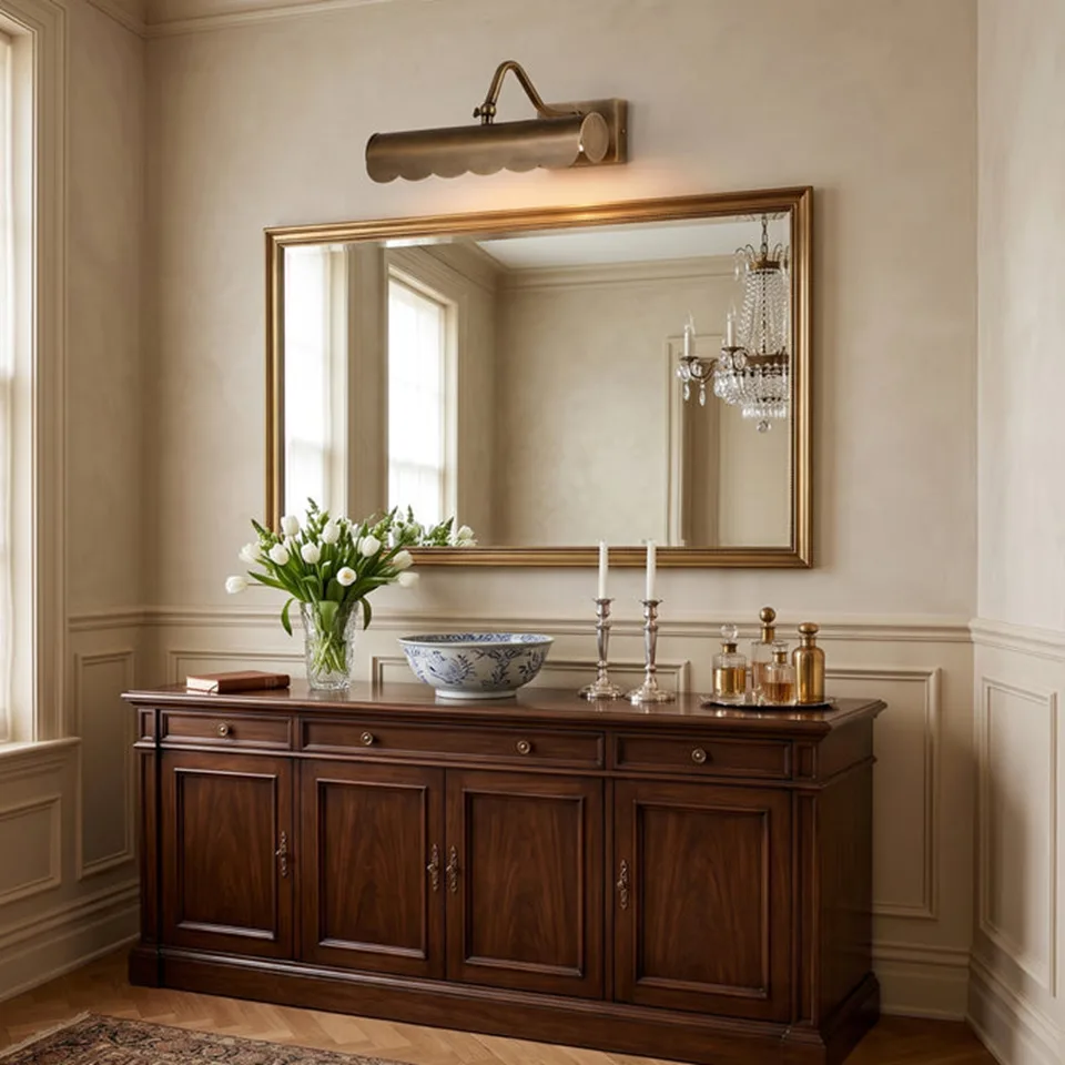Brass Mirror Light – Scalloped Picture Light, Antique Finish | Jagmag Lights 3 Brass mirror light above a gilt hallway mirror on a walnut console table