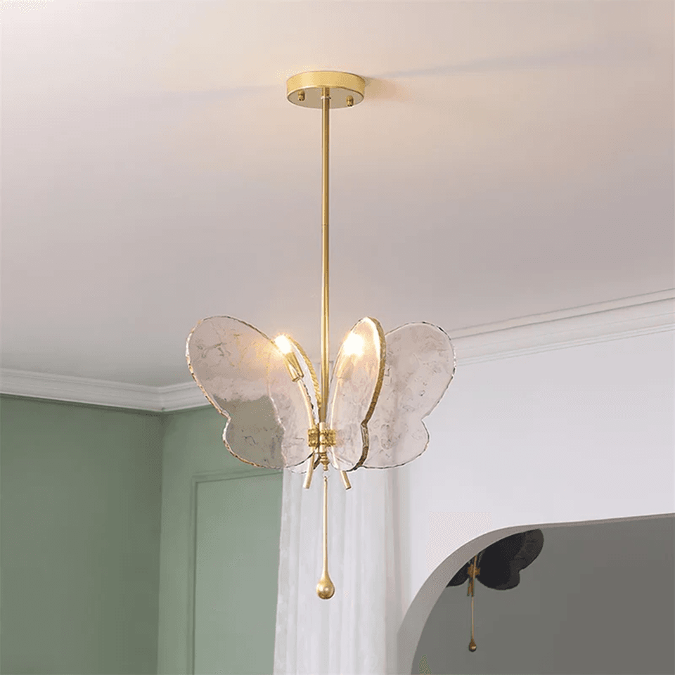 Butterfly Pendant Light – Marbled Glass Wings on Brass, 49 cm | Pink or Blue | Jagmag Lights 12 Pink butterfly pendant light lit above a hallway beside a mirror - Jagmag Lights