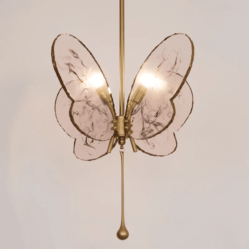 Butterfly Pendant Light – Marbled Glass Wings on Brass, 49 cm | Pink or Blue | Jagmag Lights 3 Pink butterfly pendant light lit, glowing warm through the marbled glass wings - Jagmag Lights
