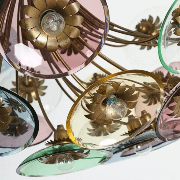 Brass petal rosette behind an amethyst glass disc with the E27 lamp visible