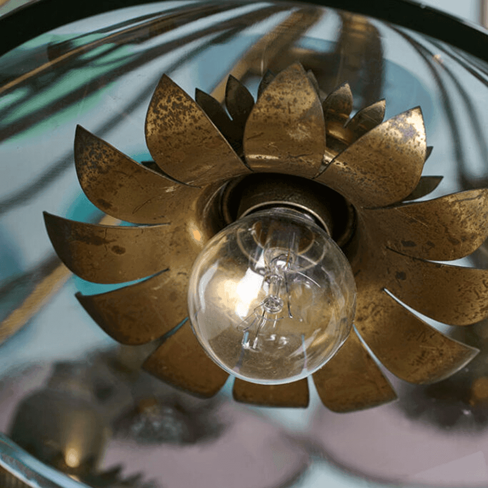 Coloured Glass Chandelier – 4 ft Brass Bowl with 6″ Glass Discs | Jagmag Lights 9 Macro detail of a brass petal rosette around a clear filament lamp
