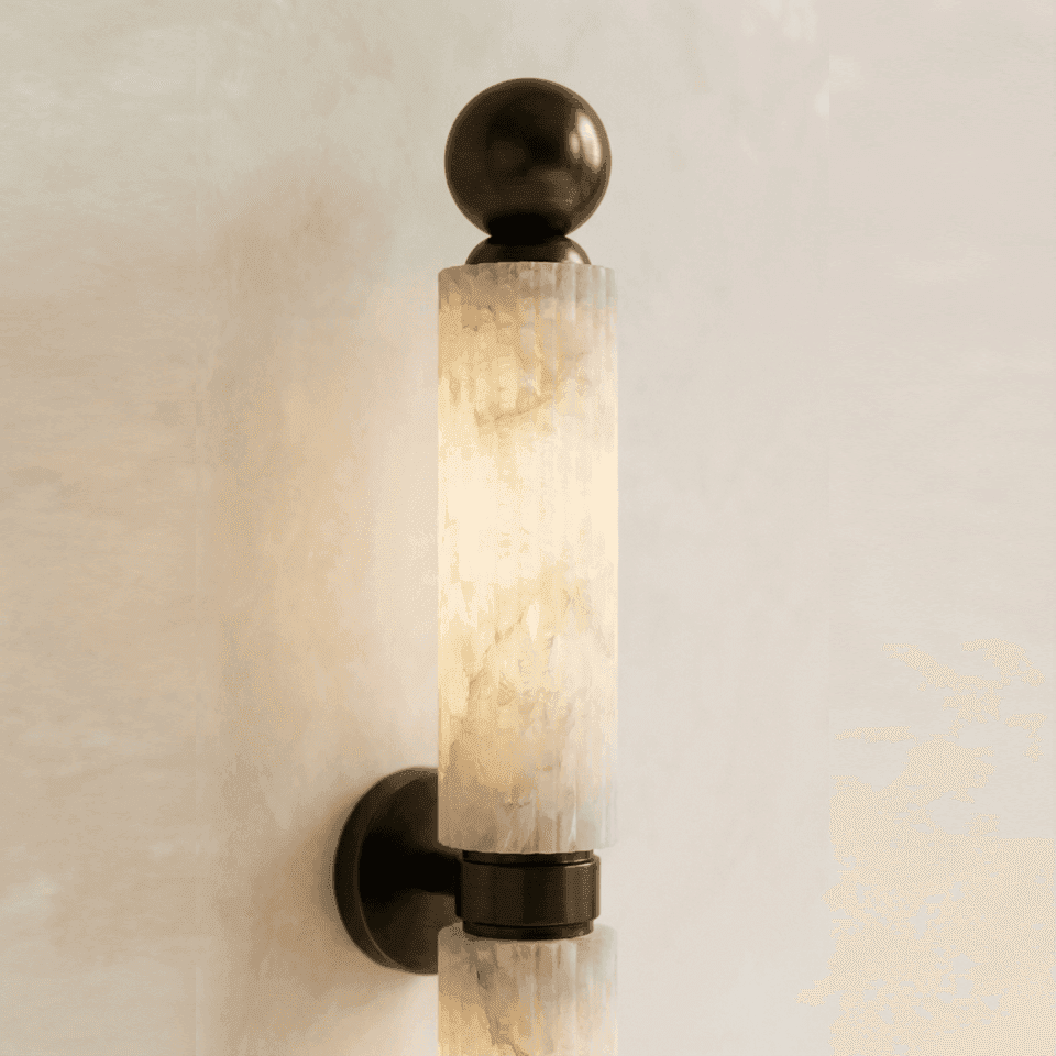 Fluted Alabaster Wall Light – Twin Tube Bronze, 50 cm | Jagmag Lights 4 Fluted alabaster wall light lit close up, stone veining glowing through the ribbed tube