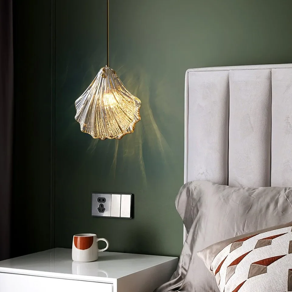 Glass Leaf Pendant Light – Clear Ribbed Glass with Brass, G9 4 Glass leaf pendant light hanging beside a bed against a deep green wall