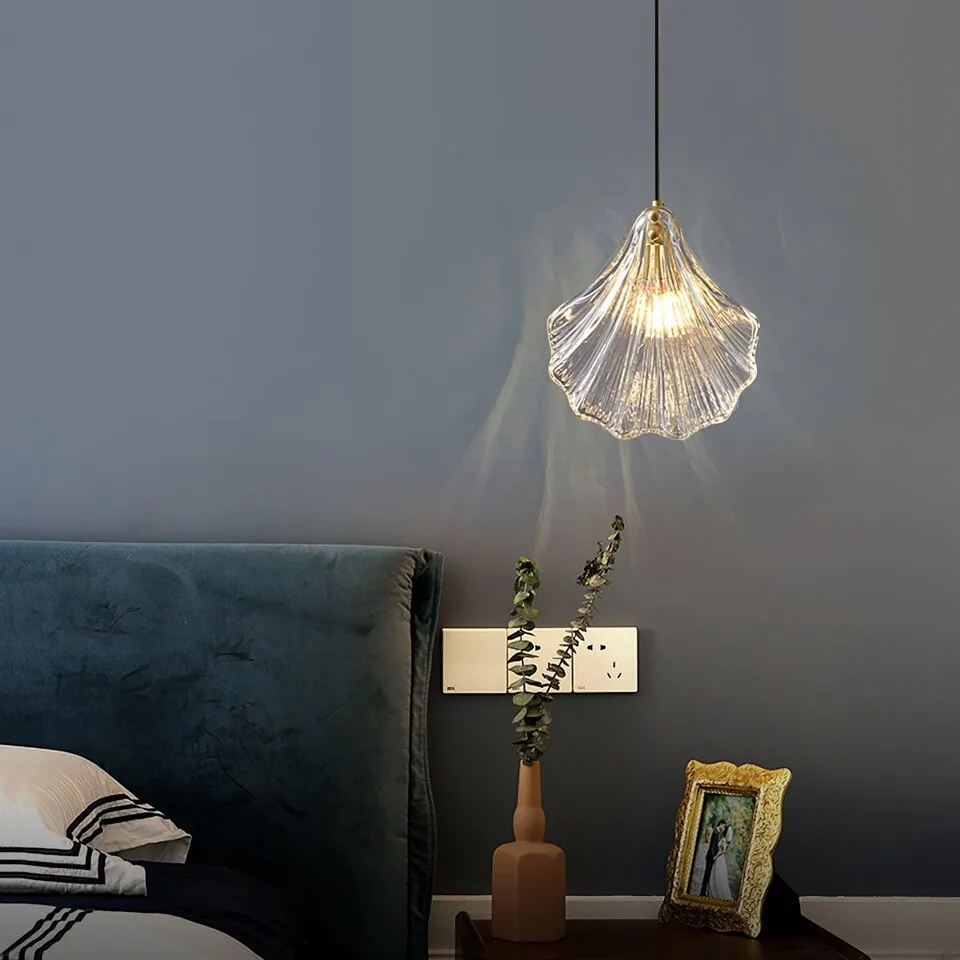 Glass Leaf Pendant Light – Clear Ribbed Glass with Brass, G9 5 Glass leaf pendant light hanging over a nightstand in a grey bedroom