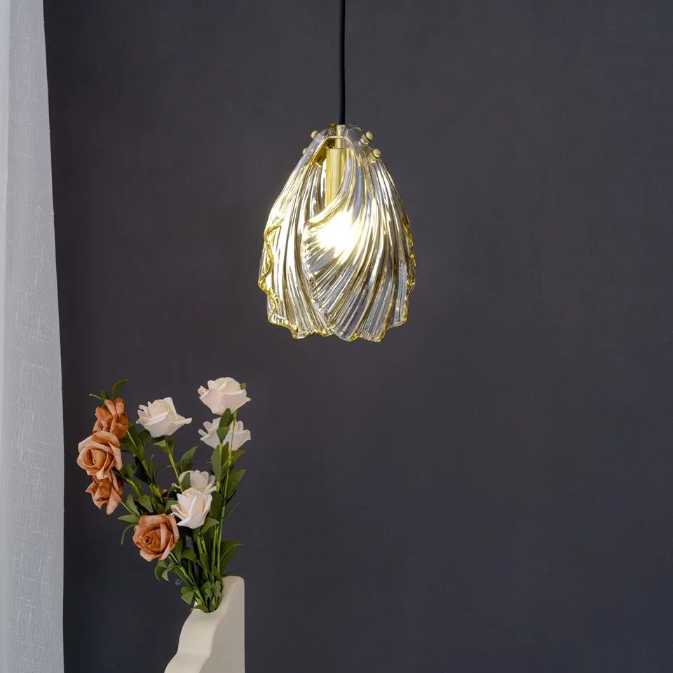 Glass Leaf Pendant Light – Clear Ribbed Glass with Brass, G9 2 Glass leaf pendant light lit warm against a dark charcoal wall