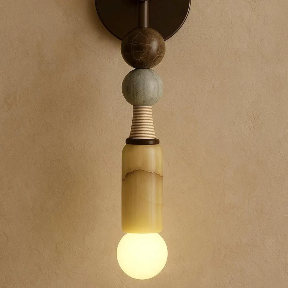 Honey Alabaster Wall Light – 450 mm Stone Stack Sconce | Jagmag Lights 3 Close-up of the honey alabaster cylinder with its dark seam and the ribbed cone above