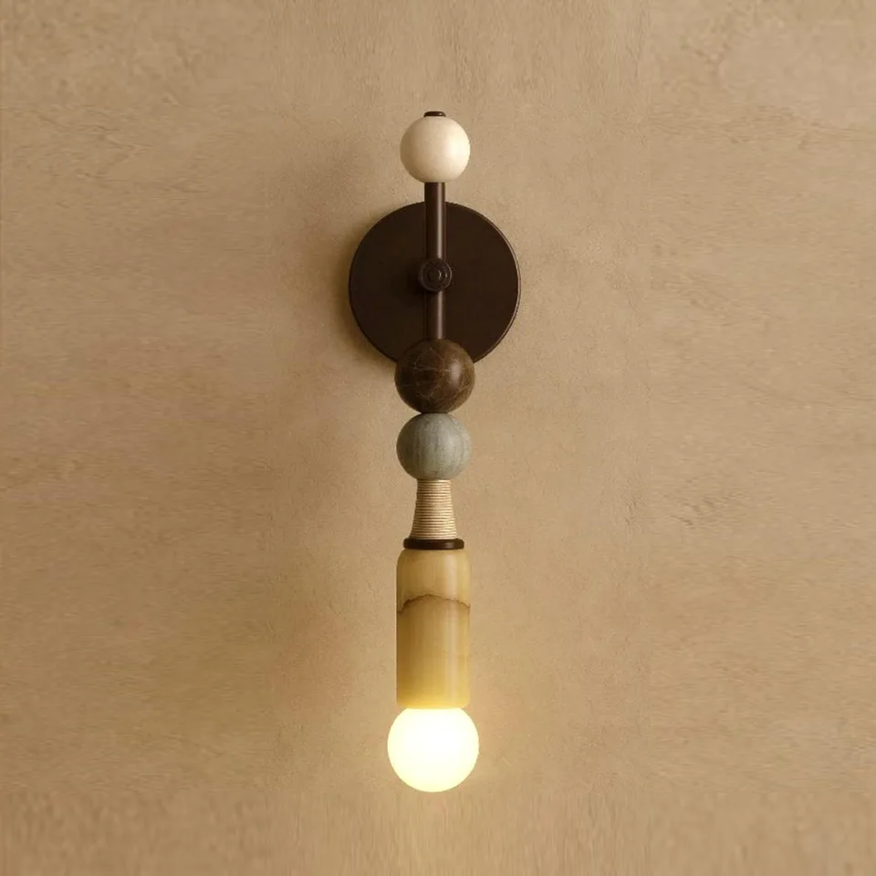 Honey Alabaster Wall Light – 450 mm Stone Stack Sconce | Jagmag Lights 2 Honey alabaster wall light against textured plaster, exposed globe lamp glowing