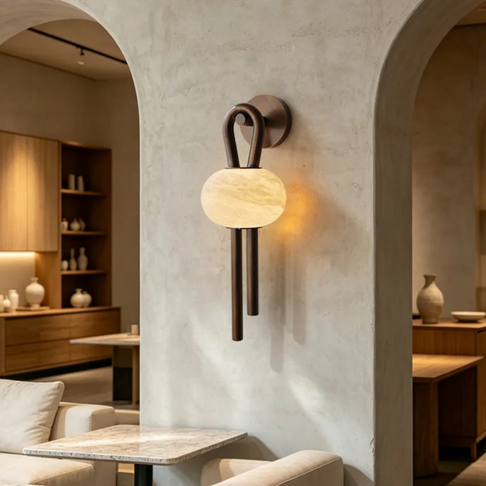 Oval Alabaster Wall Light – 53 cm Natural Stone & Bronze | Jagmag Lights 8 Oval alabaster wall light on a plaster archway wall in a cafe interior