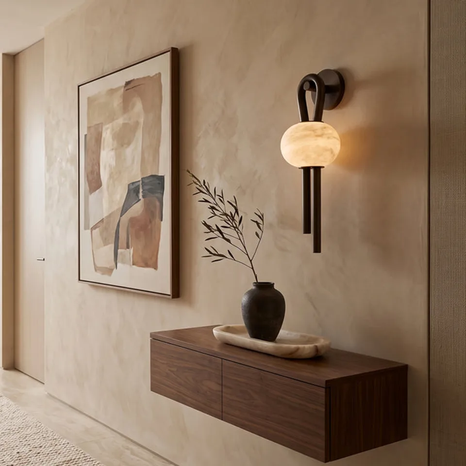 Oval Alabaster Wall Light – 53 cm Natural Stone & Bronze | Jagmag Lights 6 Oval alabaster wall light above a walnut console in a hallway, lit warm beside framed art
