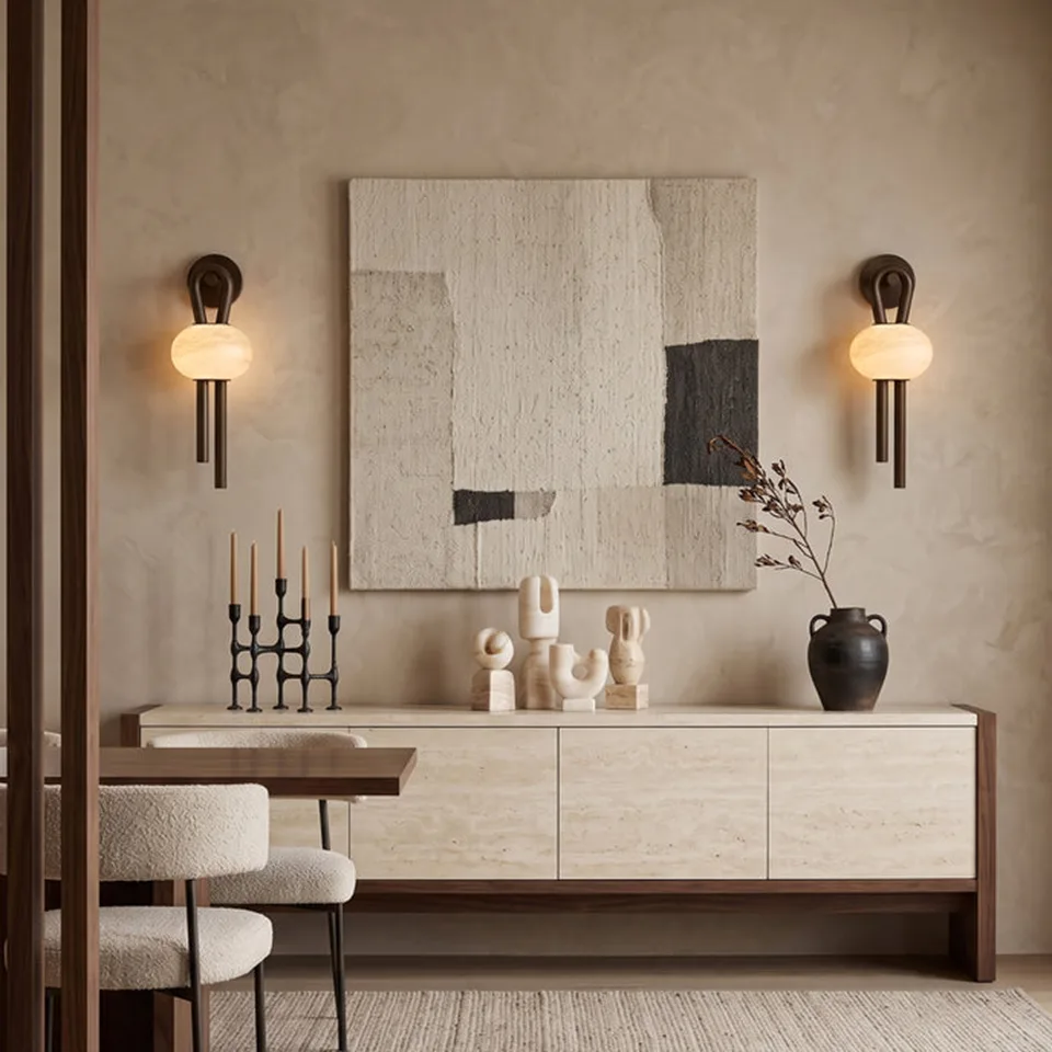 Oval Alabaster Wall Light – 53 cm Natural Stone & Bronze | Jagmag Lights 3 Pair of oval alabaster wall lights either side of artwork above a travertine dining sideboard