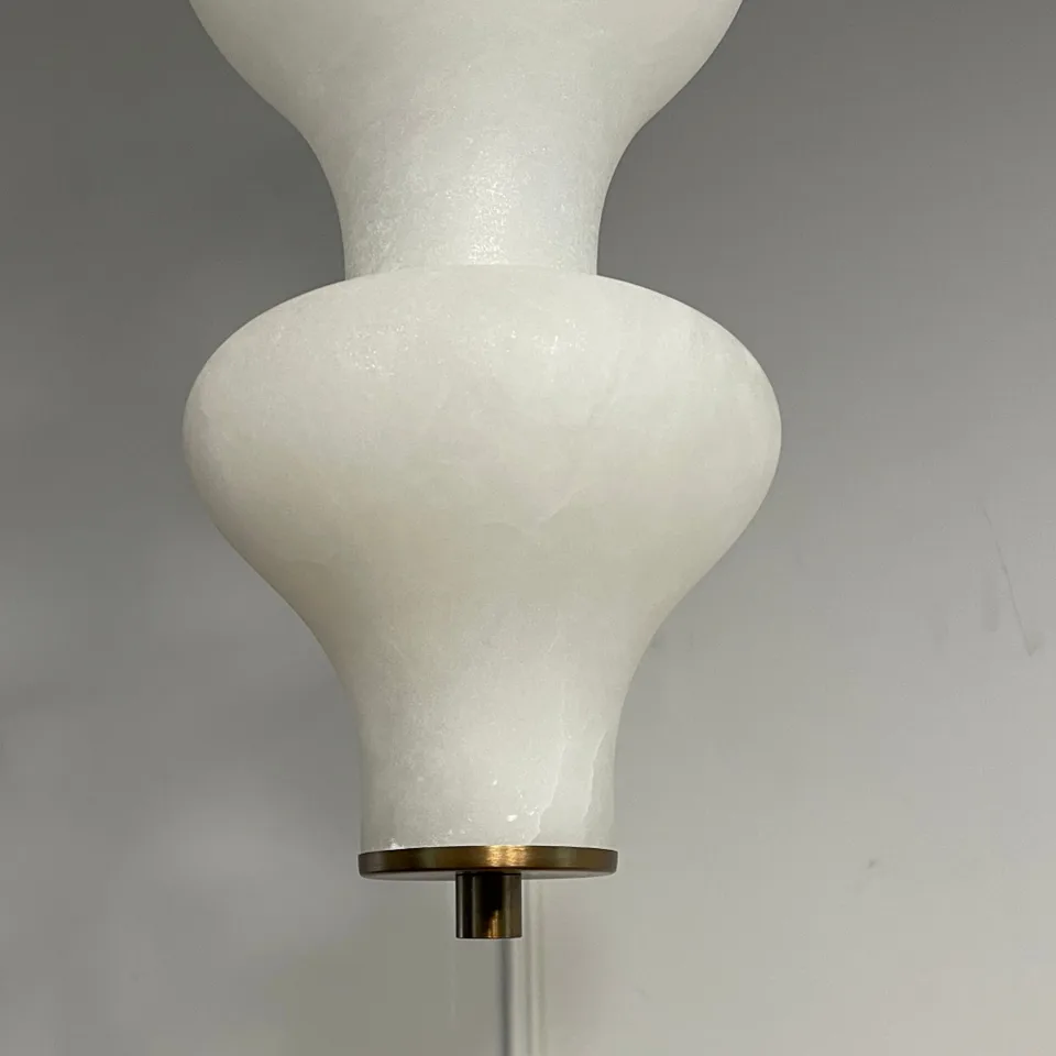 Sculptural Alabaster Pendant Light – 65 cm Stacked Stone | Jagmag Lights 5 Brass collar detail joining two hand-cut alabaster vessels