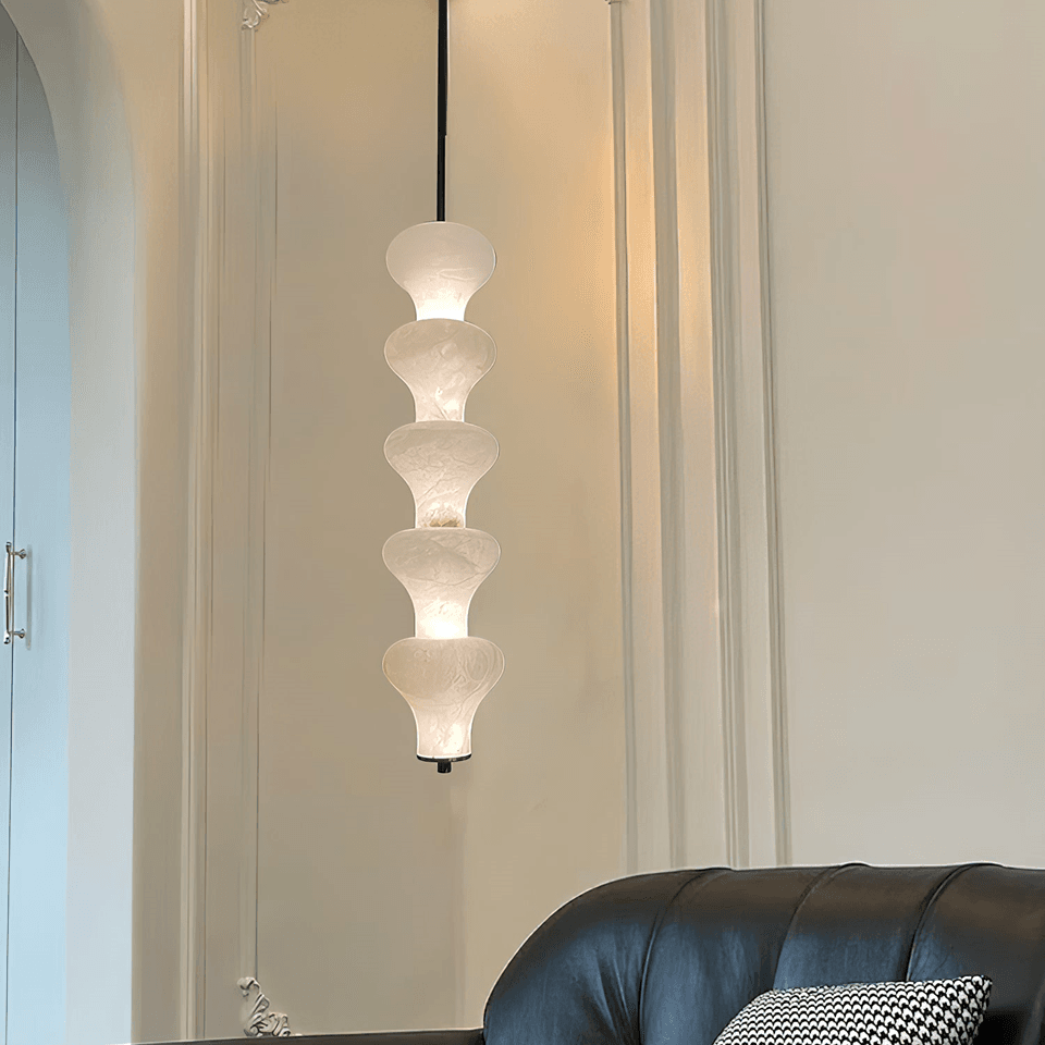 Sculptural Alabaster Pendant Light – 65 cm Stacked Stone | Jagmag Lights 7 Alabaster pendant light over a living room corner with a leather sofa