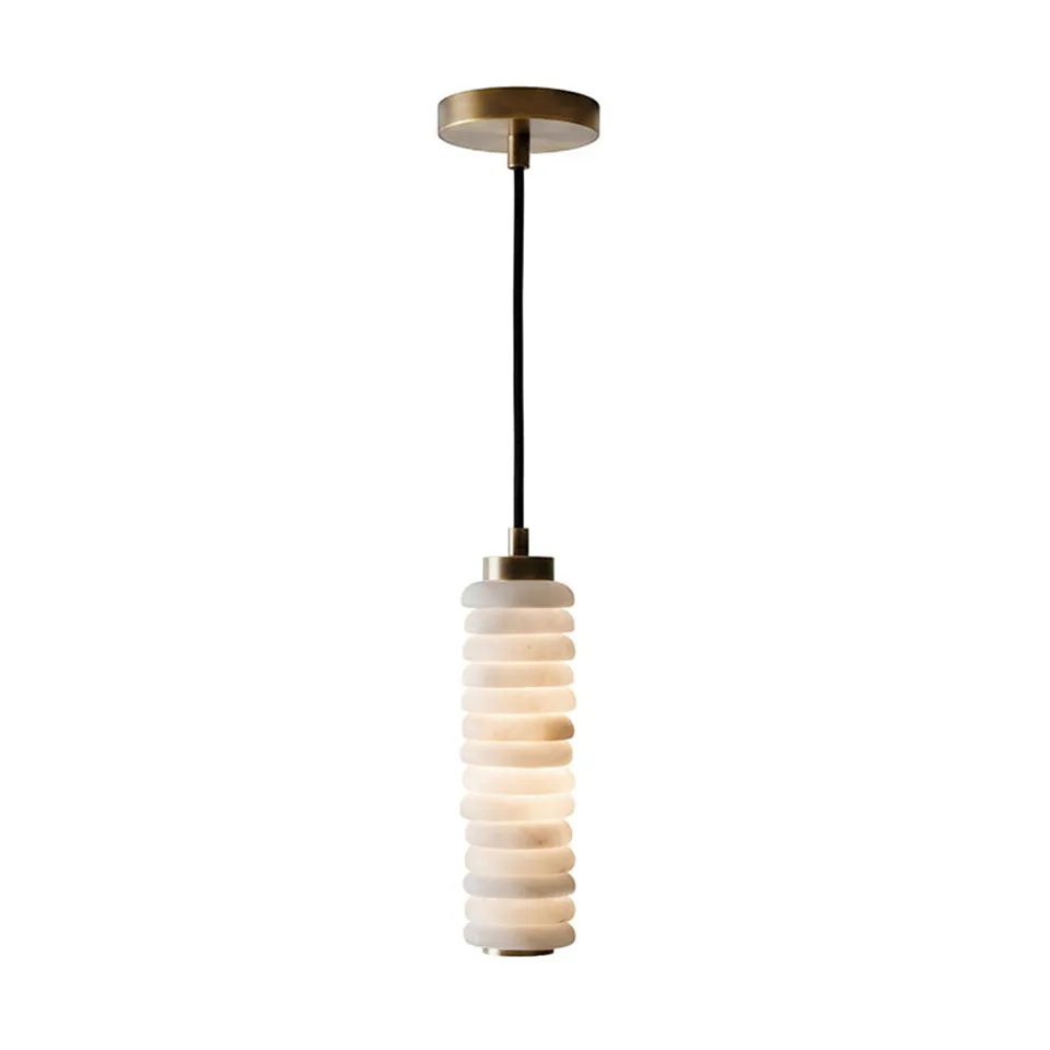 Stacked alabaster pendant light, a column of hand-cut stone rings under an antique brass cap