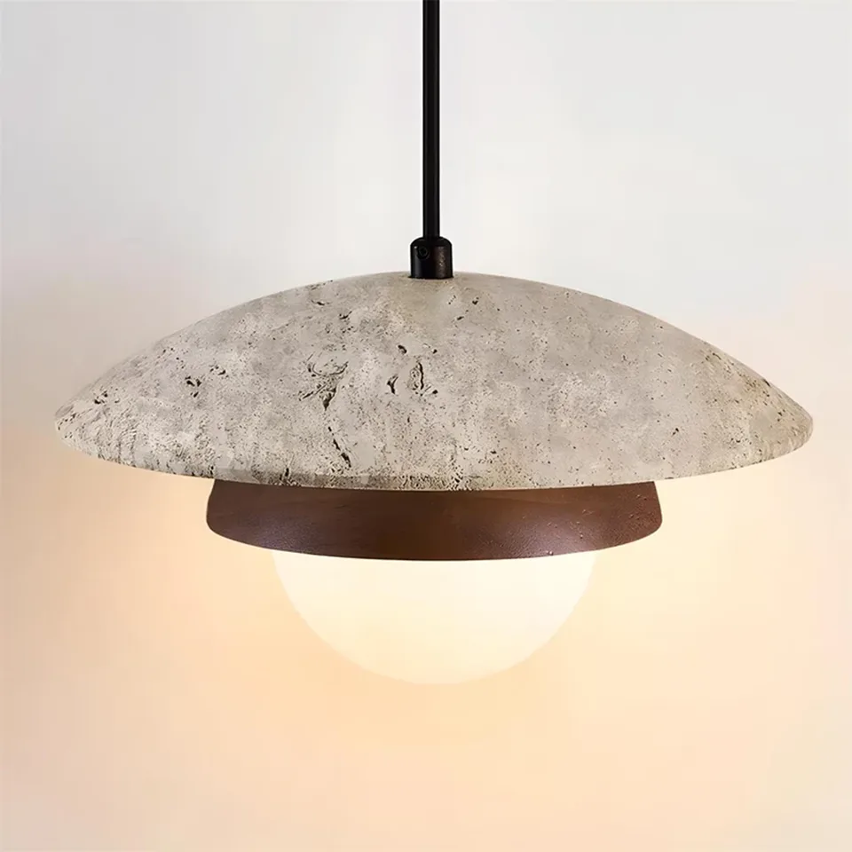 Travertine Saucer Pendant Light – Stone Disc, Rust Collar & Opal Globe, 25 cm | Jagmag Lights 2 Angled view of a travertine saucer pendant light showing the pitted stone surface - Jagmag Lights