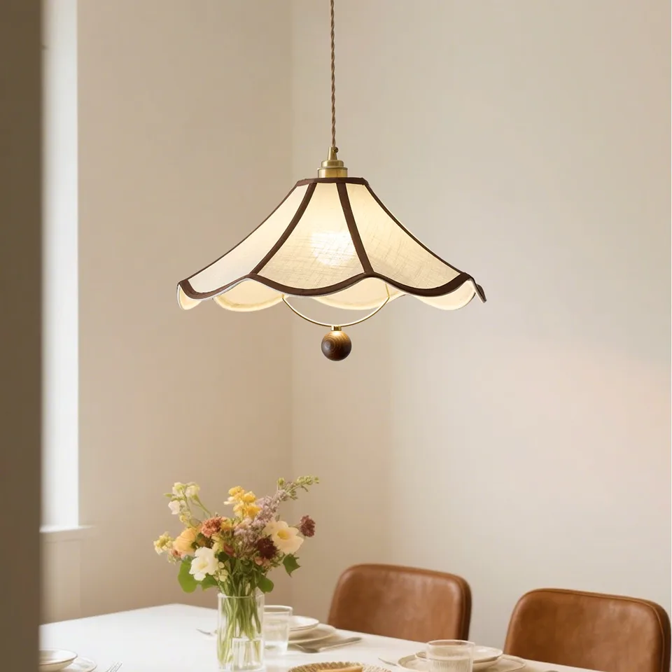Umbrella Fabric Pendant Light – Wavy Shade, Brown Trim & Wood Ball Drop, 40 cm | Jagmag Lights 7 Umbrella fabric pendant light above a set dining table with flowers - Jagmag Lights