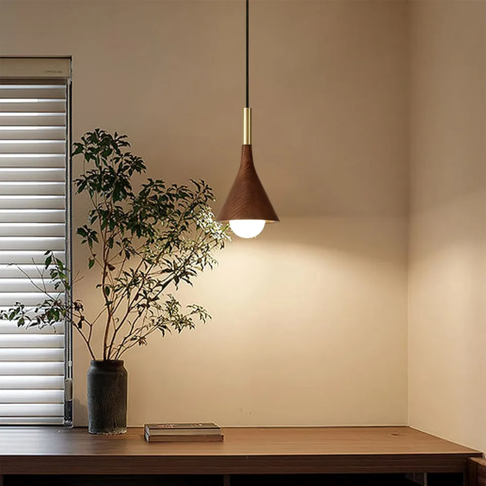 Wood Cone Pendant Light – Teak Shade, Brass Stem & Opal Glass Globe 10 Inch | Jagmag Lights 13 Wood cone pendant light glowing above a console table - Jagmag Lights
