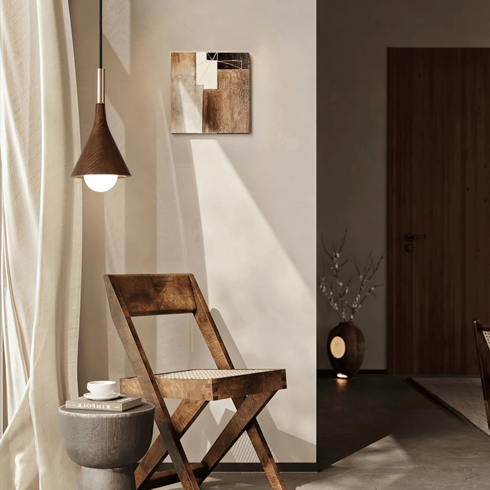 Wood Cone Pendant Light – Teak Shade, Brass Stem & Opal Glass Globe 10 Inch | Jagmag Lights 12 Wood cone pendant light over a chair in a warm reading corner - Jagmag Lights