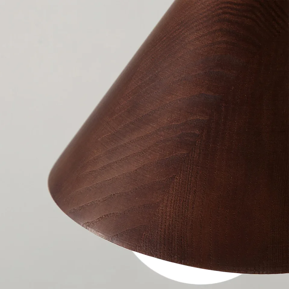 Wood Cone Pendant Light – Teak Shade, Brass Stem & Opal Glass Globe 10 Inch | Jagmag Lights 7 Close-up of the natural wood grain on a wood cone pendant light shade - Jagmag Lights