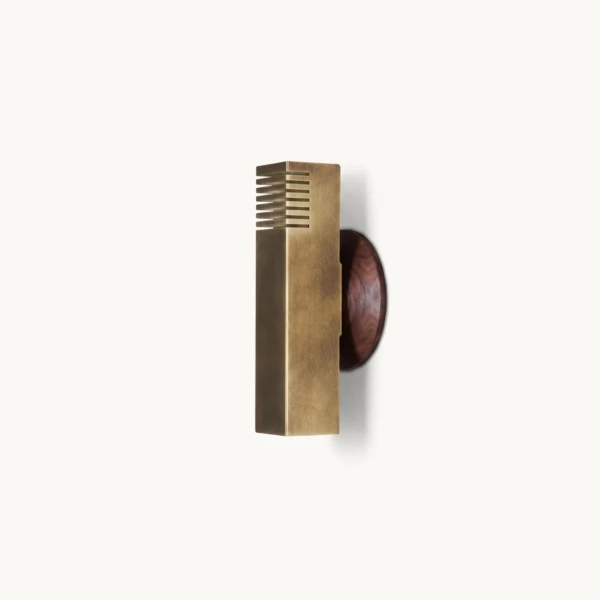 Boundary wall light from the other side: antique brass finish column on a walnut wood disc