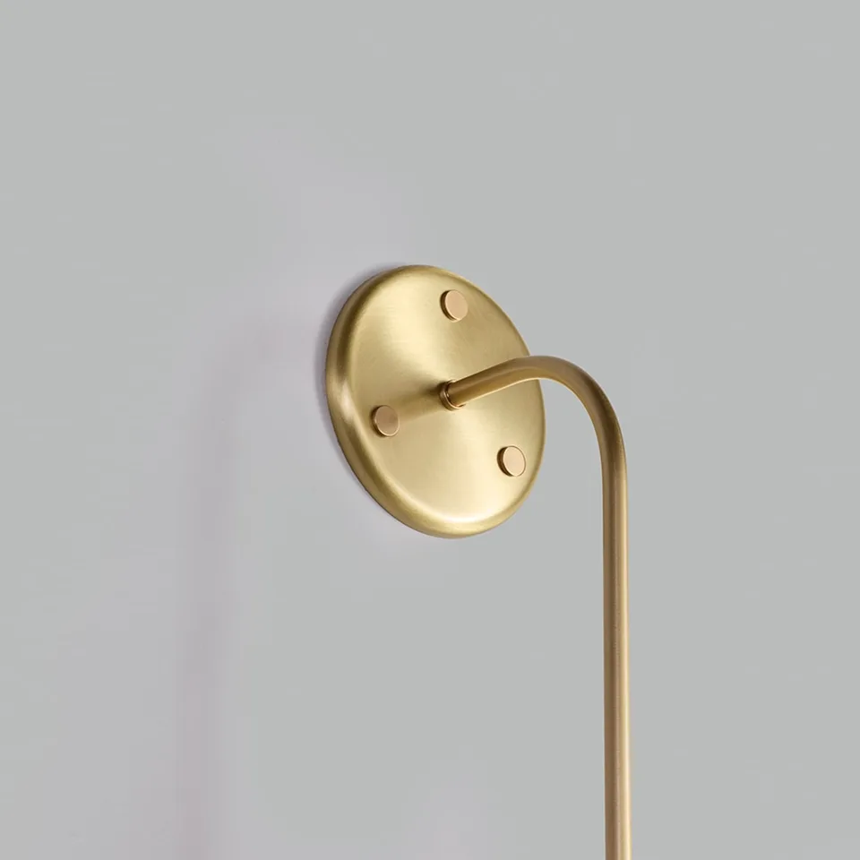 Gooseneck Wall Light – Reeded Dome & Opal Glass Ball, 90 cm | Jagmag Lights 6 Close-up of the brushed brass oval wall plate and curved arm of the gooseneck wall light