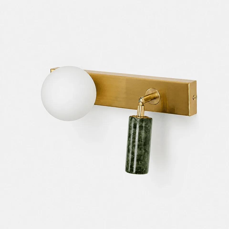 Green jade and opal glass double wall sconce on a brushed brass plate, opal globe and directional jade cylinder, on a white background