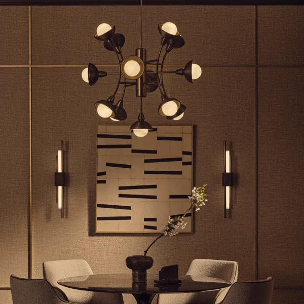 Antique-bronze sputnik chandelier above a dining table against a textured wall