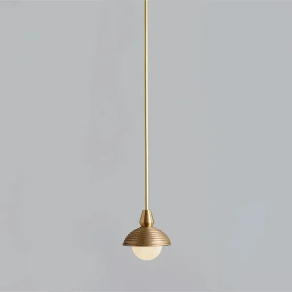 Wood pendant light on a longer drop: slim brass-finish rod down to the reeded matt gold dome and opal ball