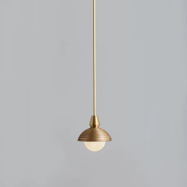 Wood pendant light on a shorter drop: reeded matt gold dome and opal ball under a brass-finish stainless steel rod