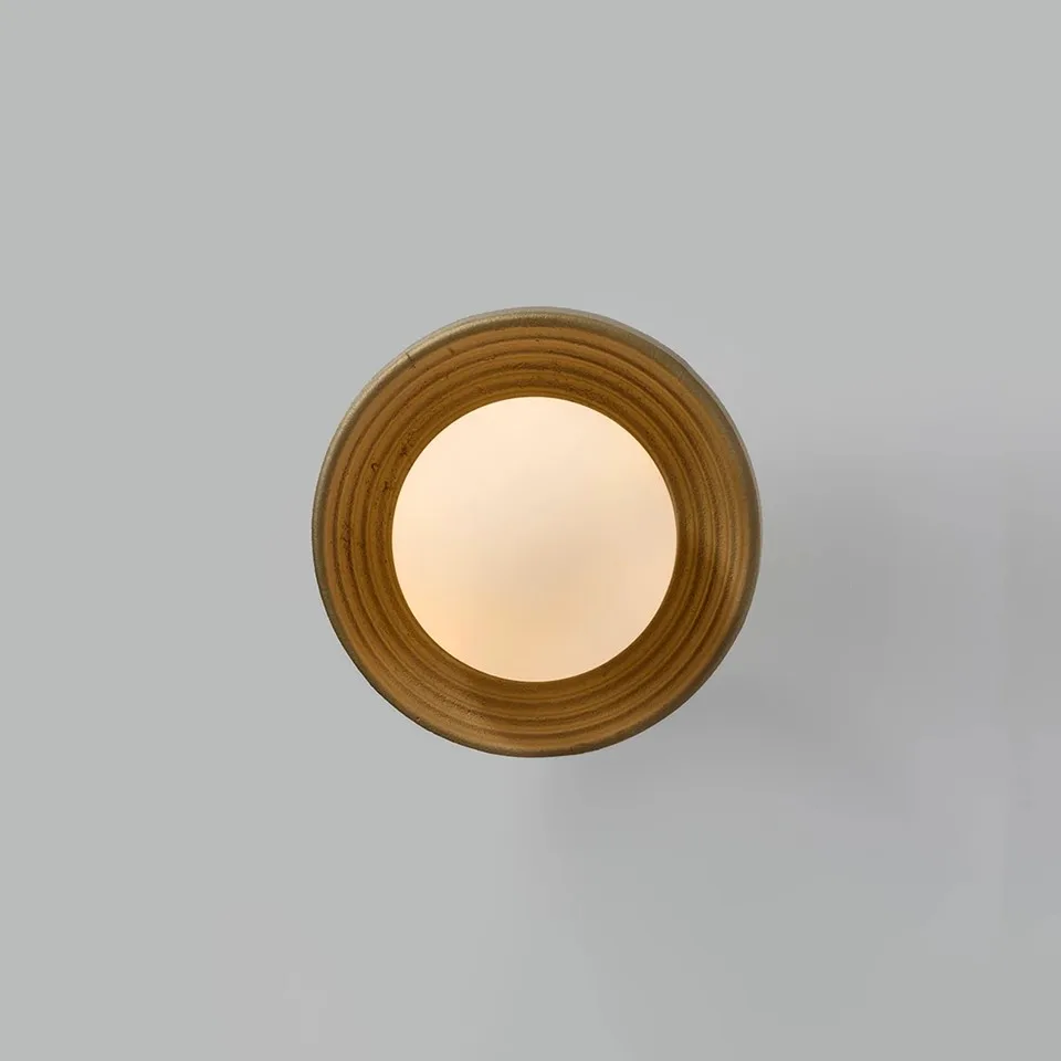 Wood Wall Light – Reeded Matt-Gold Dome & Opal Glass Ball, 16 cm | Jagmag Lights 3 Wood wall light head-on and lit, opal borosilicate glass ball glowing warm inside the reeded gold ring