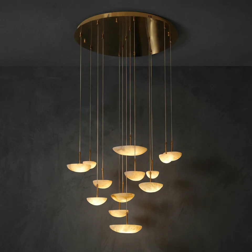Duplex chandelier with 15 glowing alabaster bowls under a round brass canopy