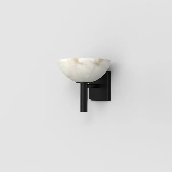 Three-quarter view of the alabaster bowl wall light showing grey veining in the stone and the black stainless steel arm