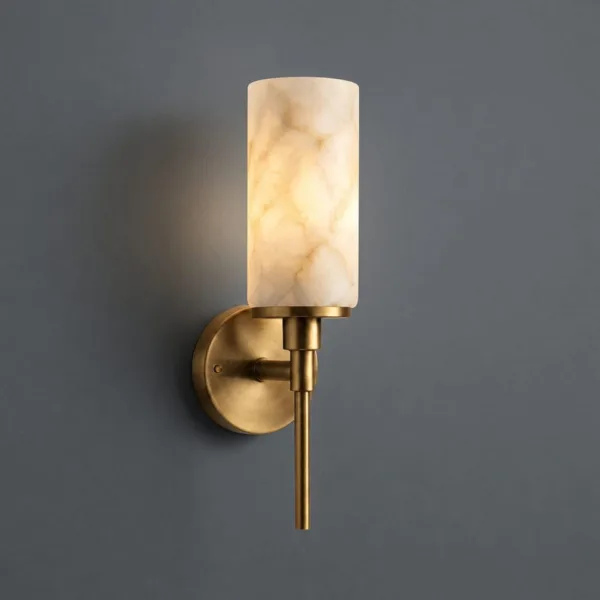 Cylinder alabaster wall lamp lit, showing cloud-like veining in the stone