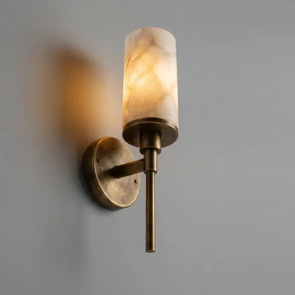 Side view of the alabaster wall lamp showing the arm and torch stem
