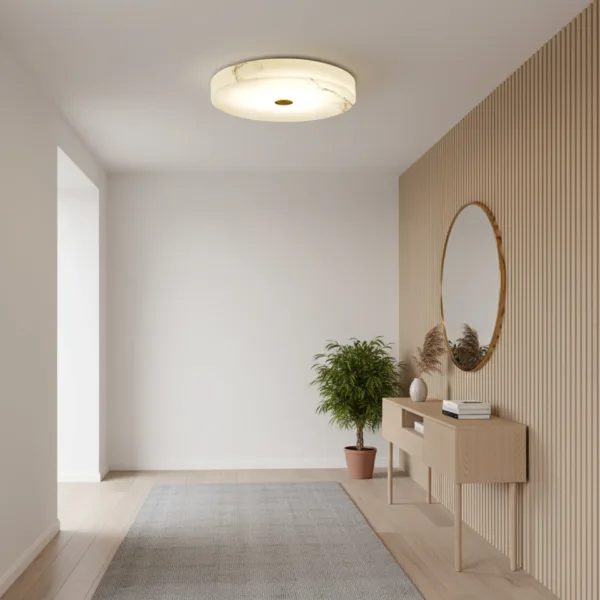 Alabaster disc ceiling light in a hallway beside a wood-panelled wall