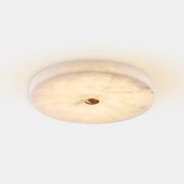Alabaster flush mount ceiling light showing natural veining when lit